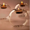Clear round handmade hollow glass candle holder in three size options