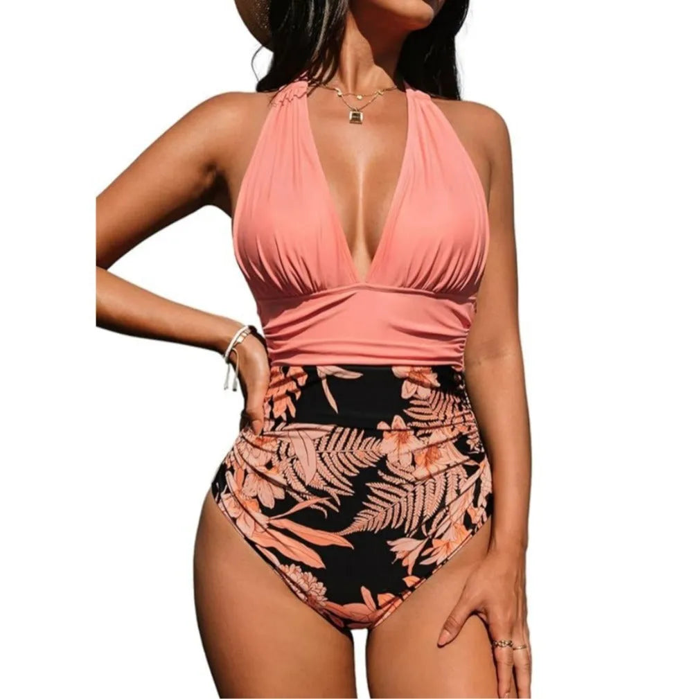 Women's one-piece halter neck swimsuit in a floral print.