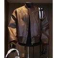 Black PU leather motorcycle jacket with litchi texture and 100cm extended length
