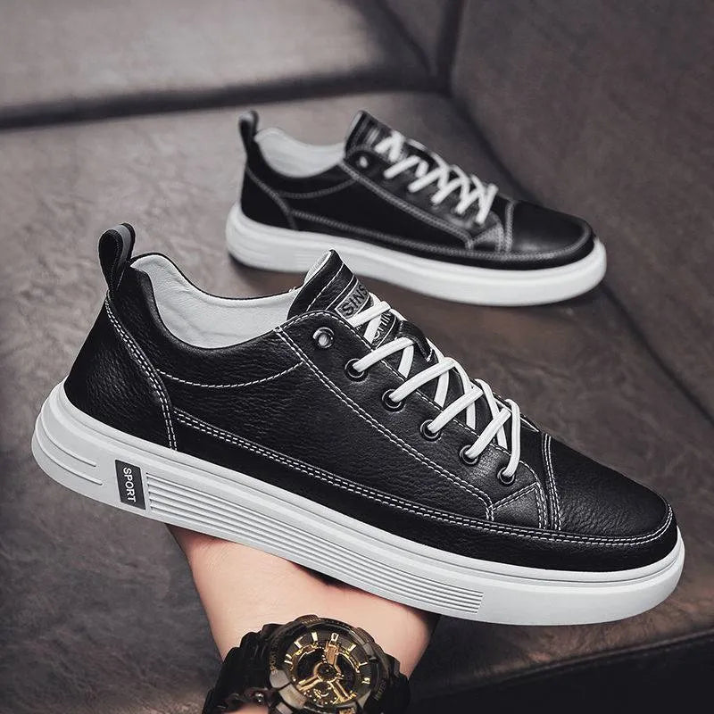 Men's white casual shoes with round toe, low heel, and shallow opening made from breathable PU material