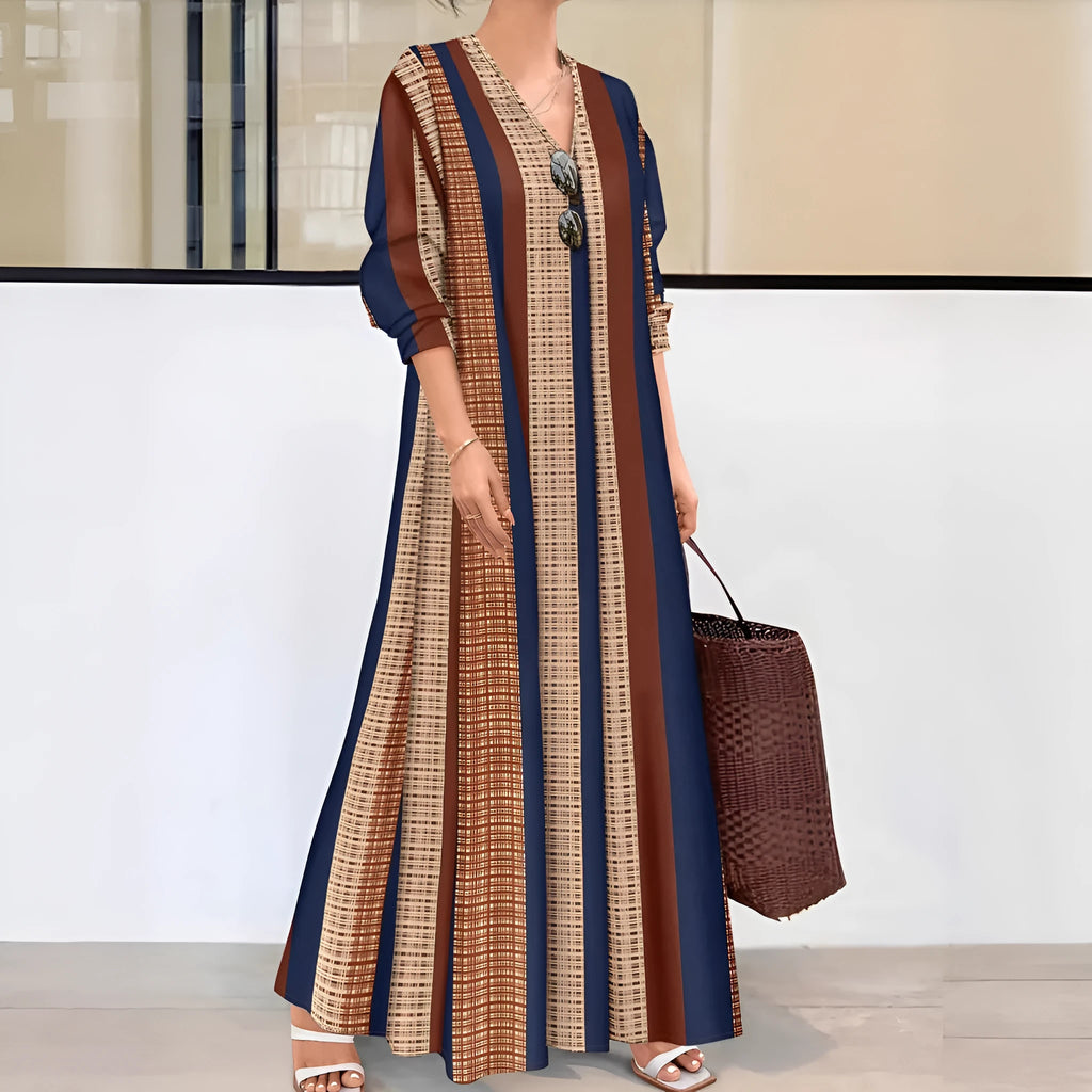 Camel coloured women's knit dress with vertical stripes, V-neck and long sleeves in A-line silhouette
