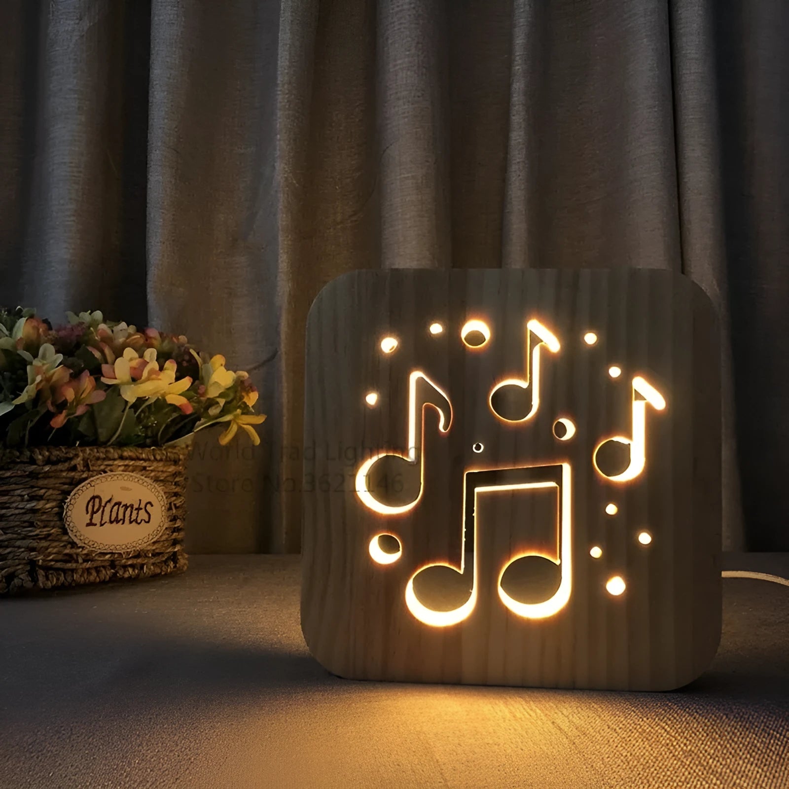 Square pine wood USB LED atmosphere lamp emitting warm white light, showing its 3D design and button switch.