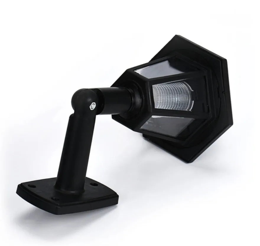 Black hexagonal solar wall lamp with LED illumination for outdoor garden lighting