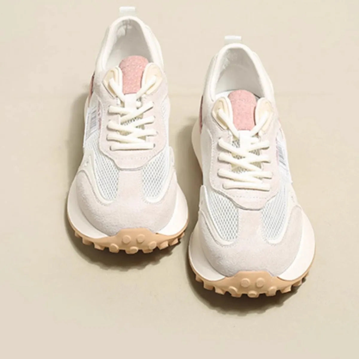 Women's grey and pink retro sneakers with rubber soles and mesh lining in low-top design