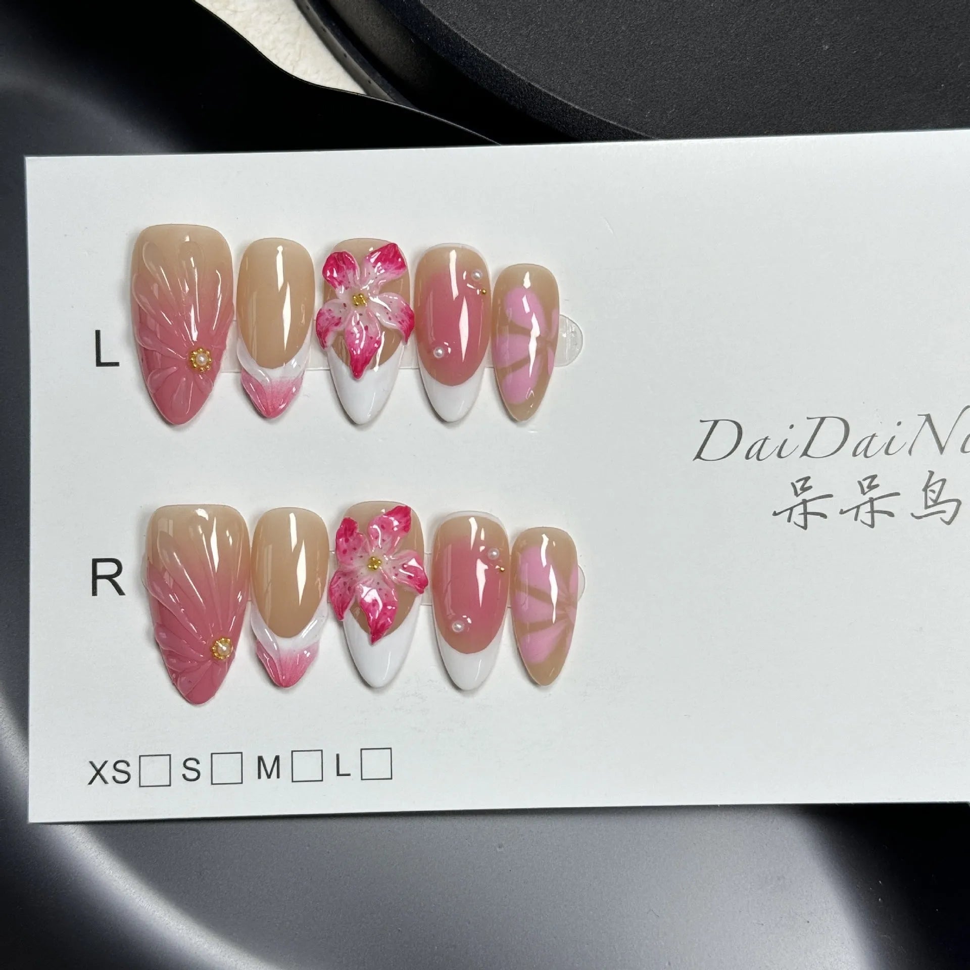French style lily and fluid ice flower designs on transparent plastic wearable nail armour pieces in four sizes