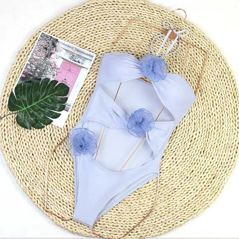 Women's black and blue stripes one-piece swimsuit with 3D flower pattern