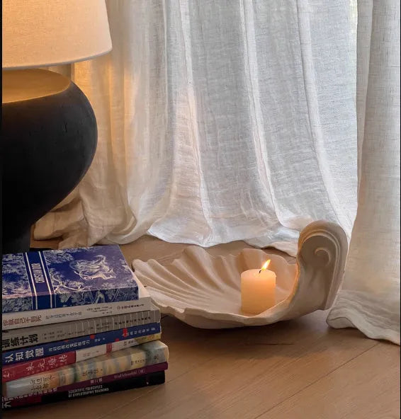 White resin fruit plate decoration with simulation shell design on table setting