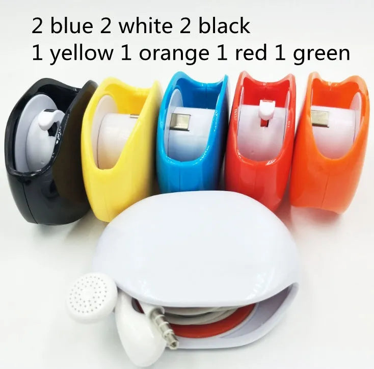 Automatic earphone cable winder with telescopic push mechanism showing compact design
