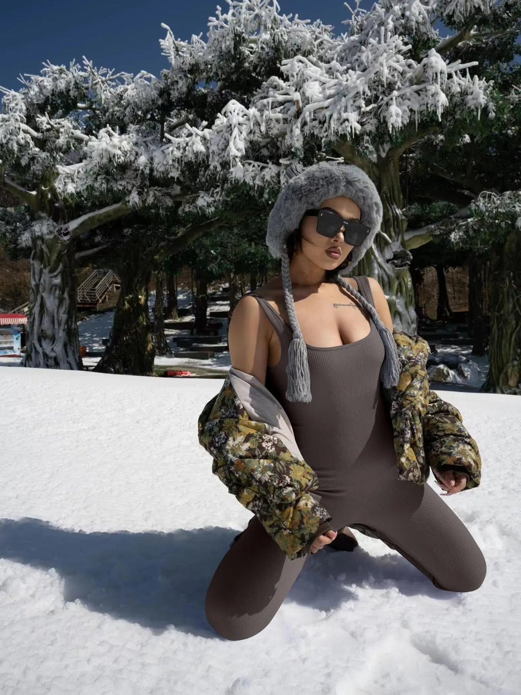 Women's long sleeve spandex suspender tank top tights with a button detail waistband.