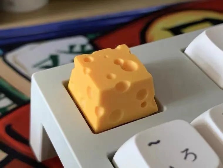 Yellow resin cheese wedge artisan keycap for mechanical keyboards with Cherry MX stem