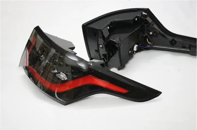 A pair of red LED brake lights for car rear bumper mounting.