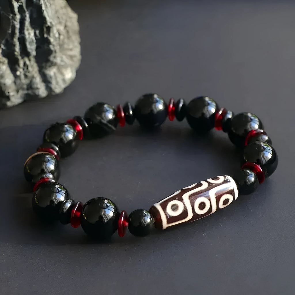 Black agate dzi bead bracelet with 11mm geometry beads and hand-woven construction