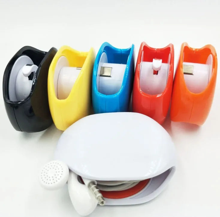 Automatic earphone cable winder with telescopic push mechanism showing compact design