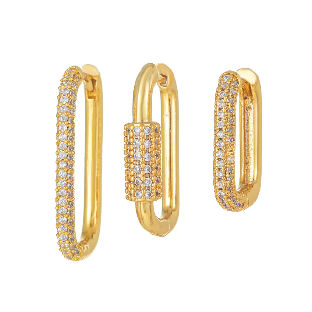 Three geometric square ear clips with inlaid zircon stones in gold and white gold colours