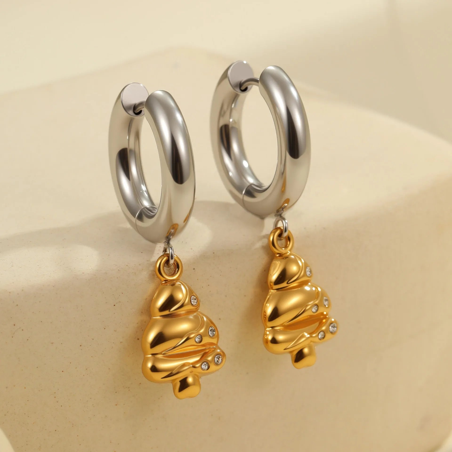 Women's stainless steel Christmas tree earrings with 18K electroplated finish showing heart and star shapes