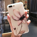 Embossed floral TPU phone case in black with colour-matching buttons for iPhone models