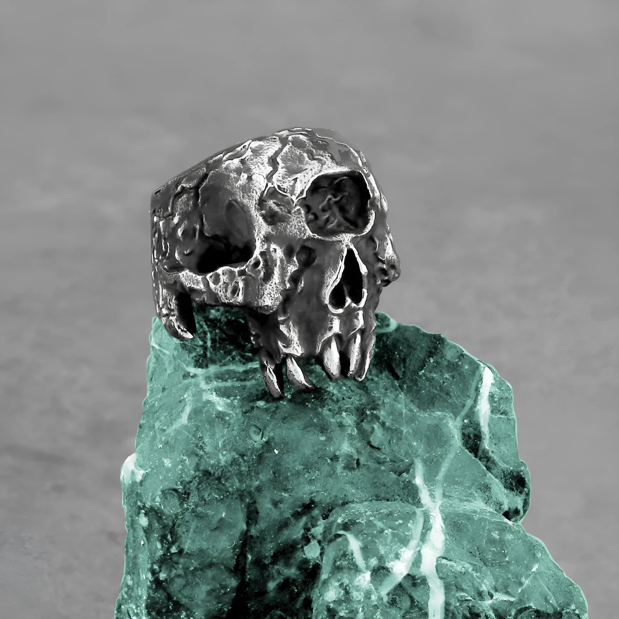 Electroplated alloy ring with one-eyed skull design in retro punk style