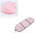 Blue silicone dog bath brush with finger grip handle for washing and massaging