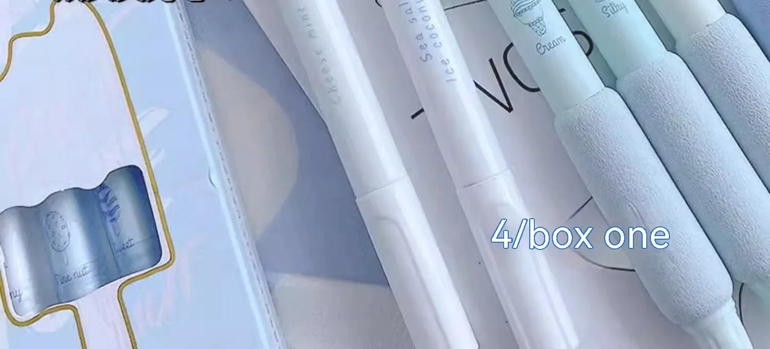 Four dual fluorescent calligraphy practice pens with 0.5mm nibs in neutral ink colours on white background