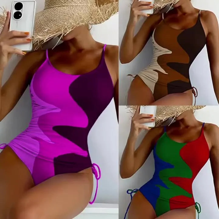 Blue sleeveless one-piece swimsuit with a backless, tight-fitting design on a mannequin.