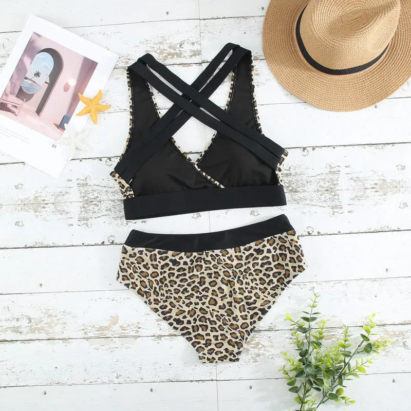 White leopard print floral bikini with cross band V-neck top and high-leg briefs.