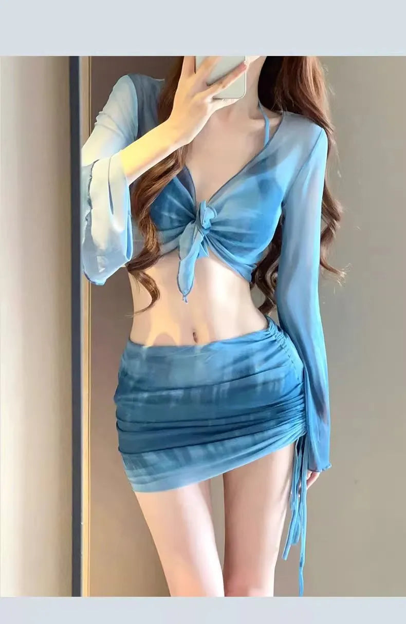 Blue women's four-piece bikini swimsuit set with high-waist briefs and a backless top.