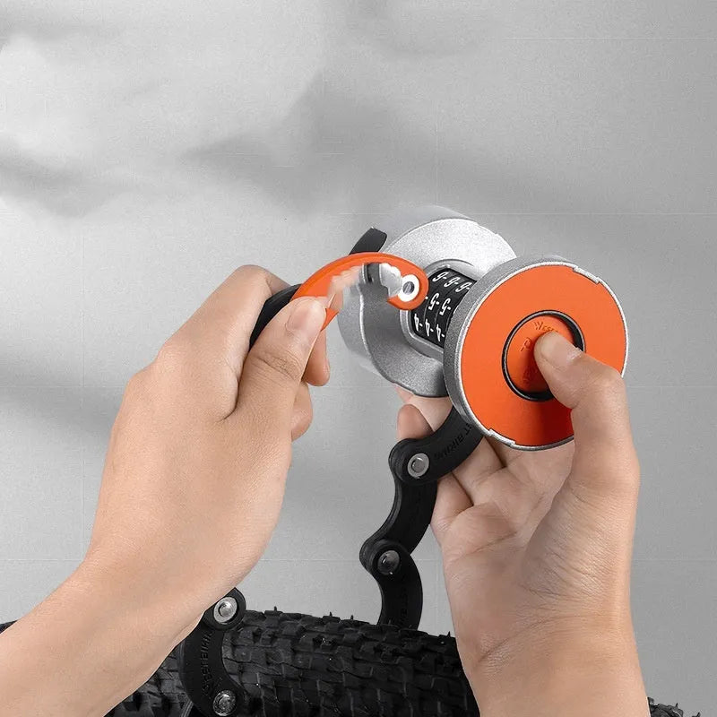 Folding bicycle lock in black orange colour showing collapsed and extended positions