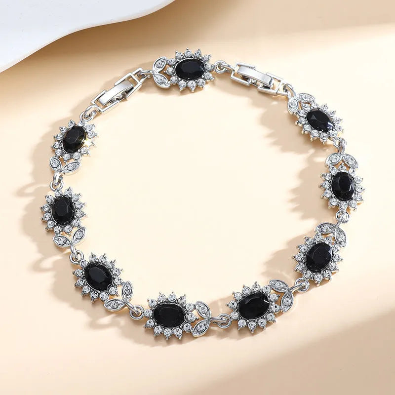 Personality Trend women's simple zircon bracelet in environmentally friendly alloy, shown in one of nine gemstone colour options.