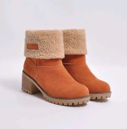 Women's mid-calf suede snow boots in black with a thick flat heel and round toe.