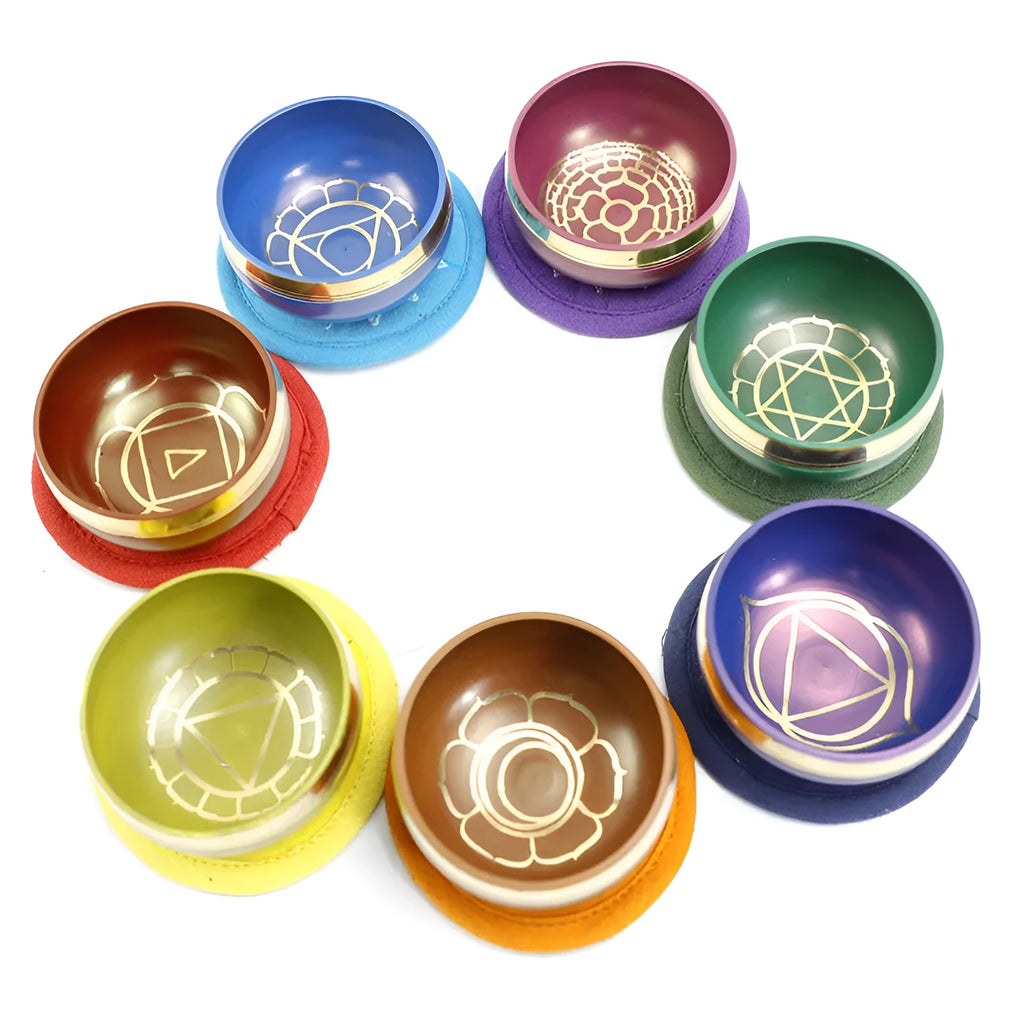Handmade Himalayan singing bowl percussion instrument in seven colours for yoga meditation