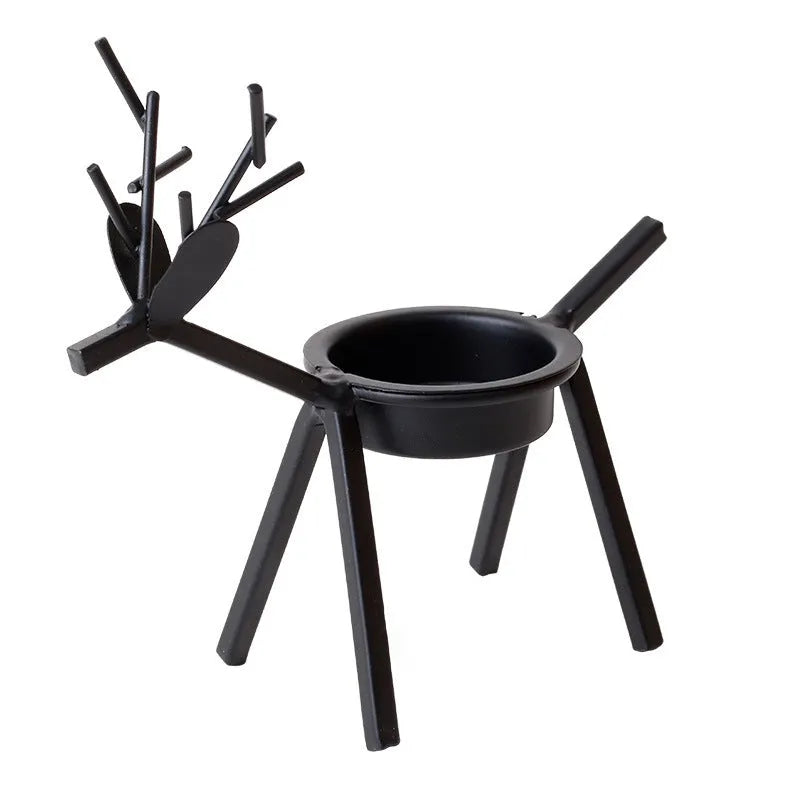 Black iron Christmas candlestick with deer or elk design for candle holding