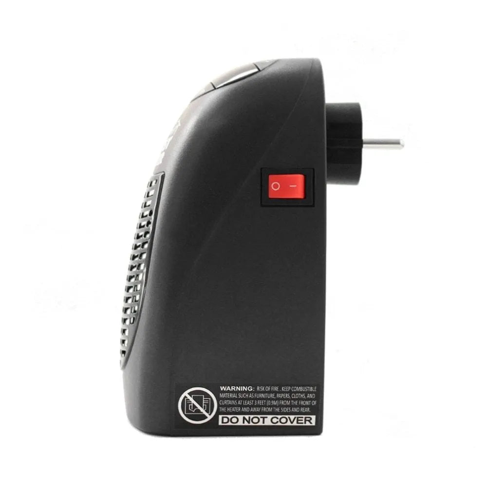 Black compact ceramic heater with digital display and rotating plug on desk