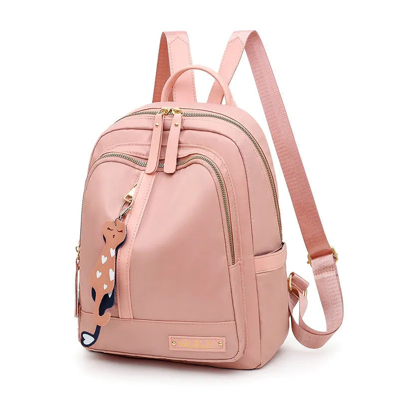 Women's nylon casual backpack in black with double shoulder straps and front pocket