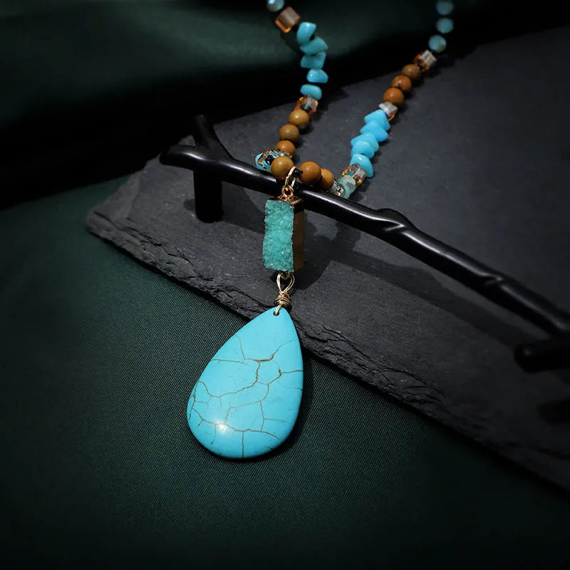 Turquoise blue water drop pendant necklace with heart shape design on mixed material ball bead chain