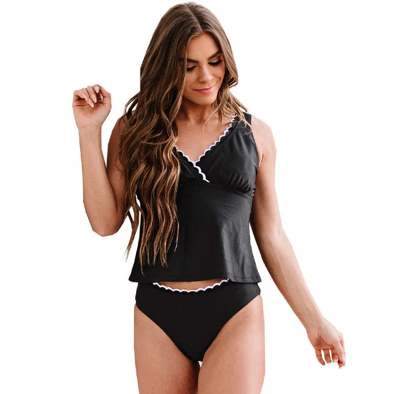 Black women's one-piece swimsuit with sleeveless design and solid colour