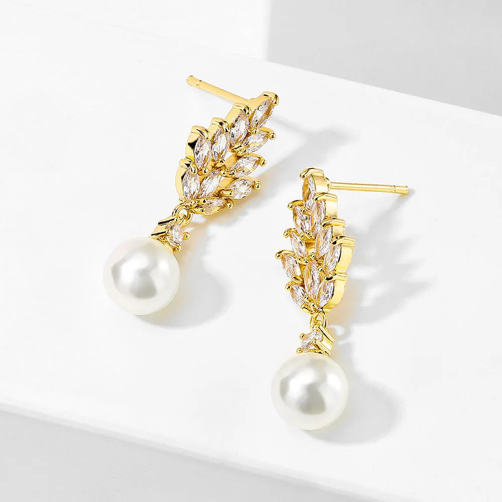 Geometric floral earrings with micro-set zircon stones in gold, platinum, or rose gold plating.