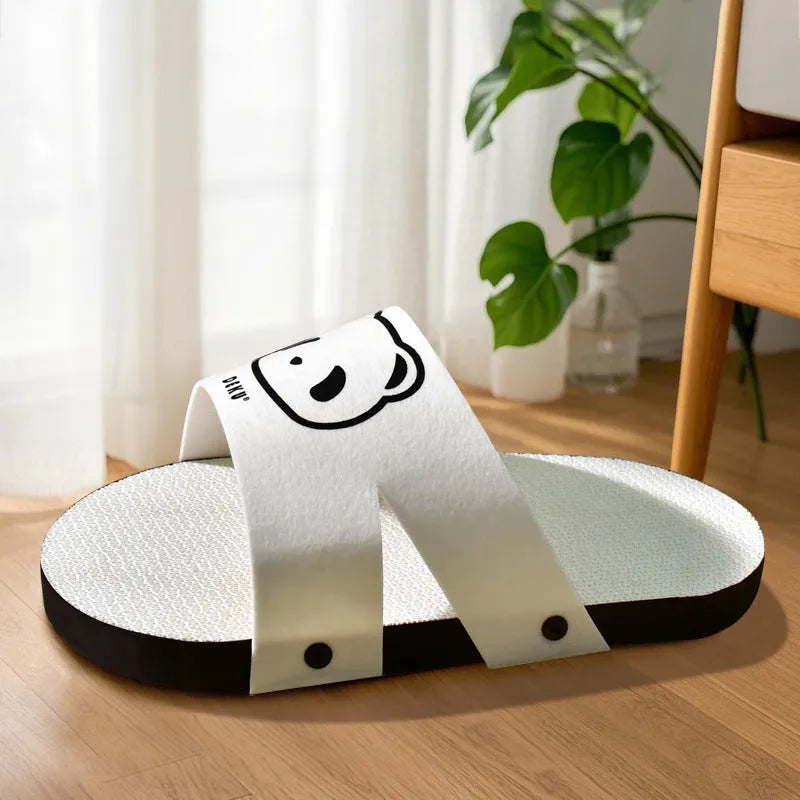 White corrugated paper cat scratch board in a slipper style shape.