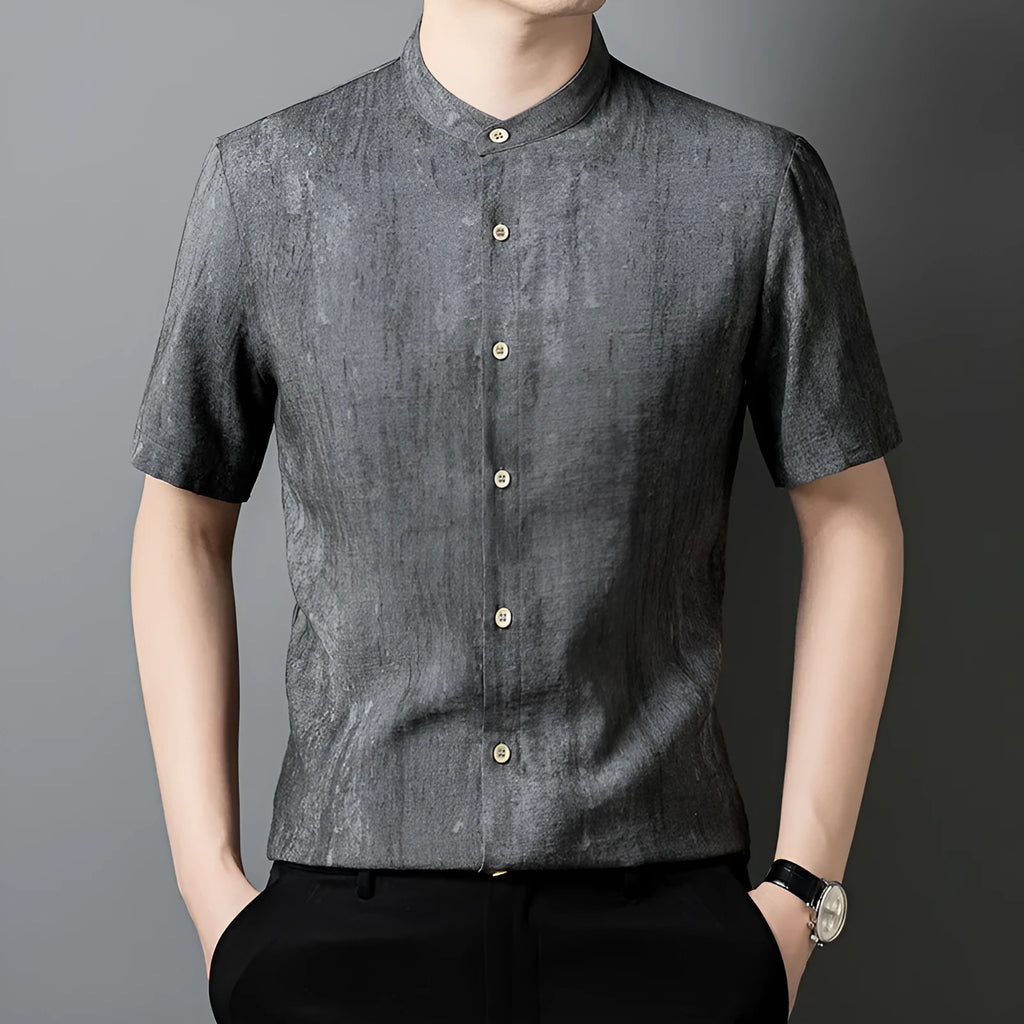Men's loose fit linen shirt in solid colour with stand collar, shown in black grey.