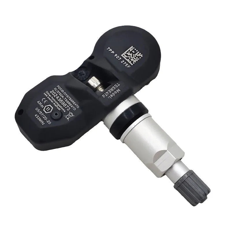 Black tyre pressure monitor sensor unit for Audi vehicles with wireless monitoring capability