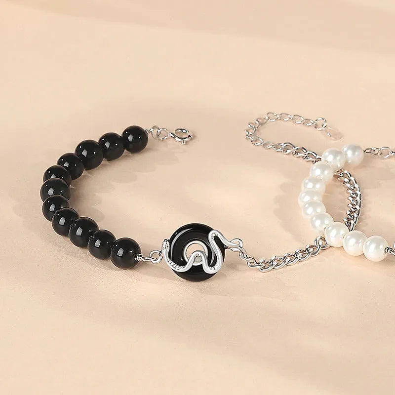 925 sterling silver couple bracelet with obsidian pearl and snake zodiac motif
