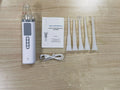 Milky white tonsil stone extractor with stainless steel tips for oral calculus removal