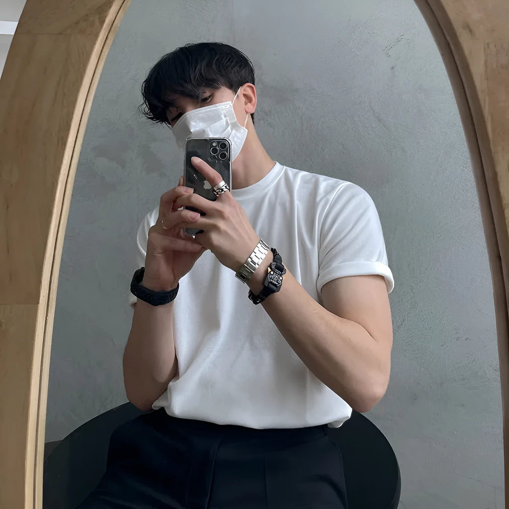 Cotton half sleeve t-shirt for men in slim fit available in black and white solid colours