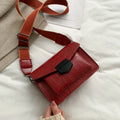 Vintage PU leather crossbody bag in black showing 20cm width and crossbody strap