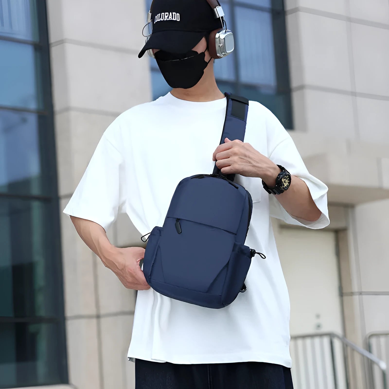 Men's waterproof chest bag in grey showing dimensions and shoulder strap