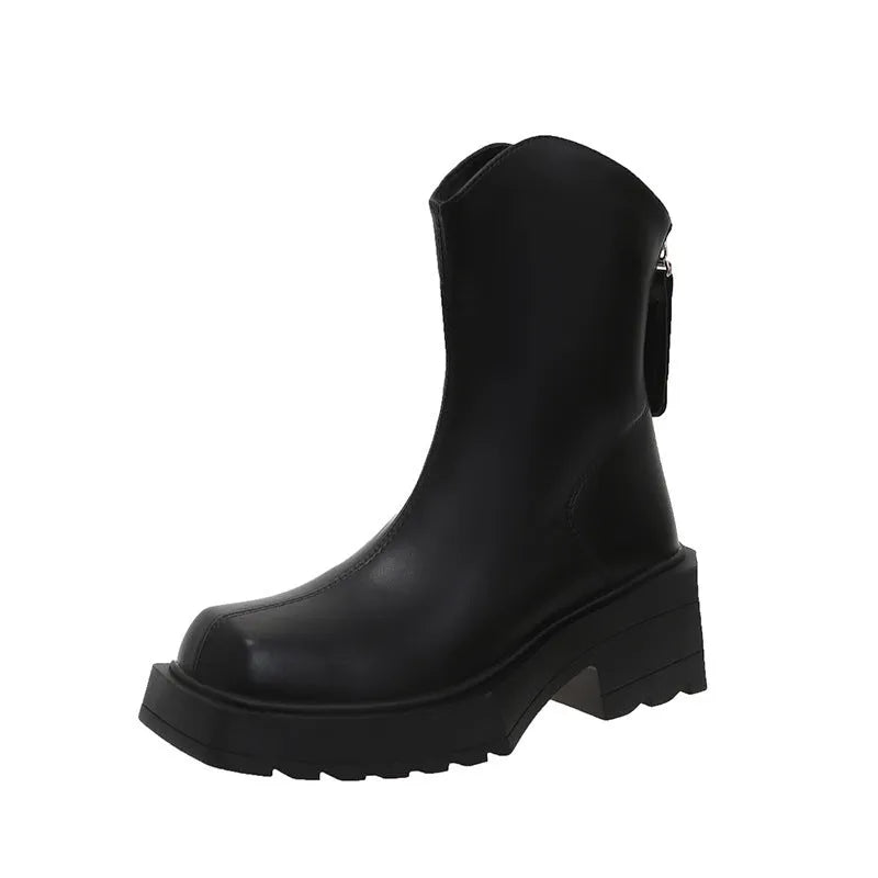 Black platform Martin booties for women with a square toe, back zipper, and a mid-calf height.
