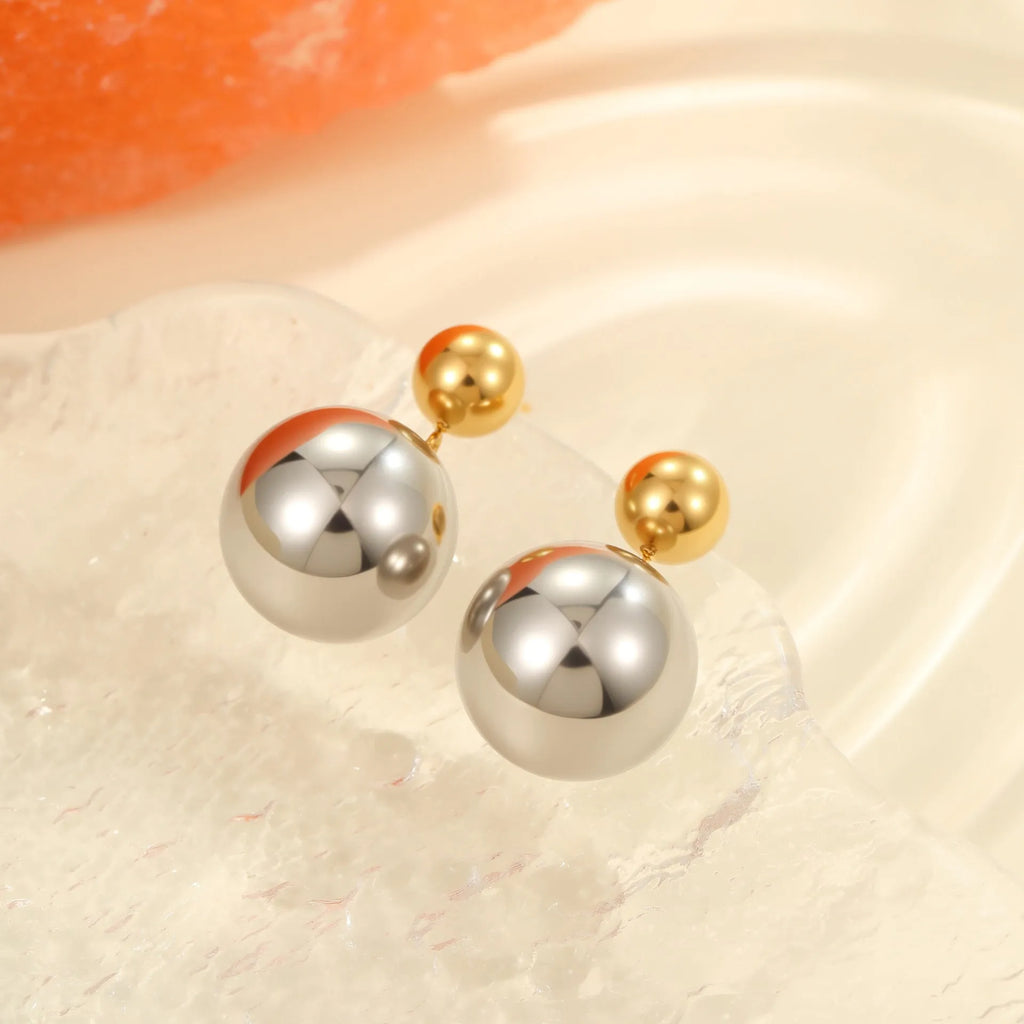 Stainless steel ear studs with colour-block electroplated finish and geometric round bead design