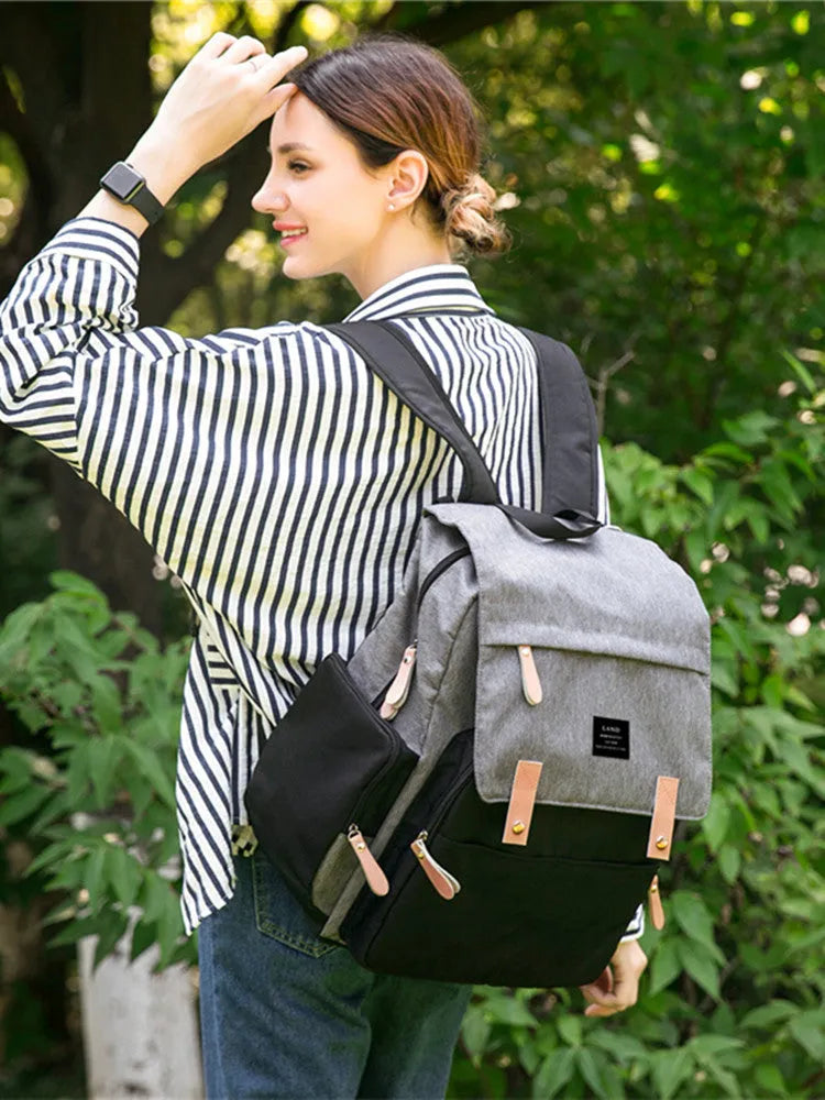 LAND Mommy large capacity oxford cloth diaper backpack with changing mat in grey colour.