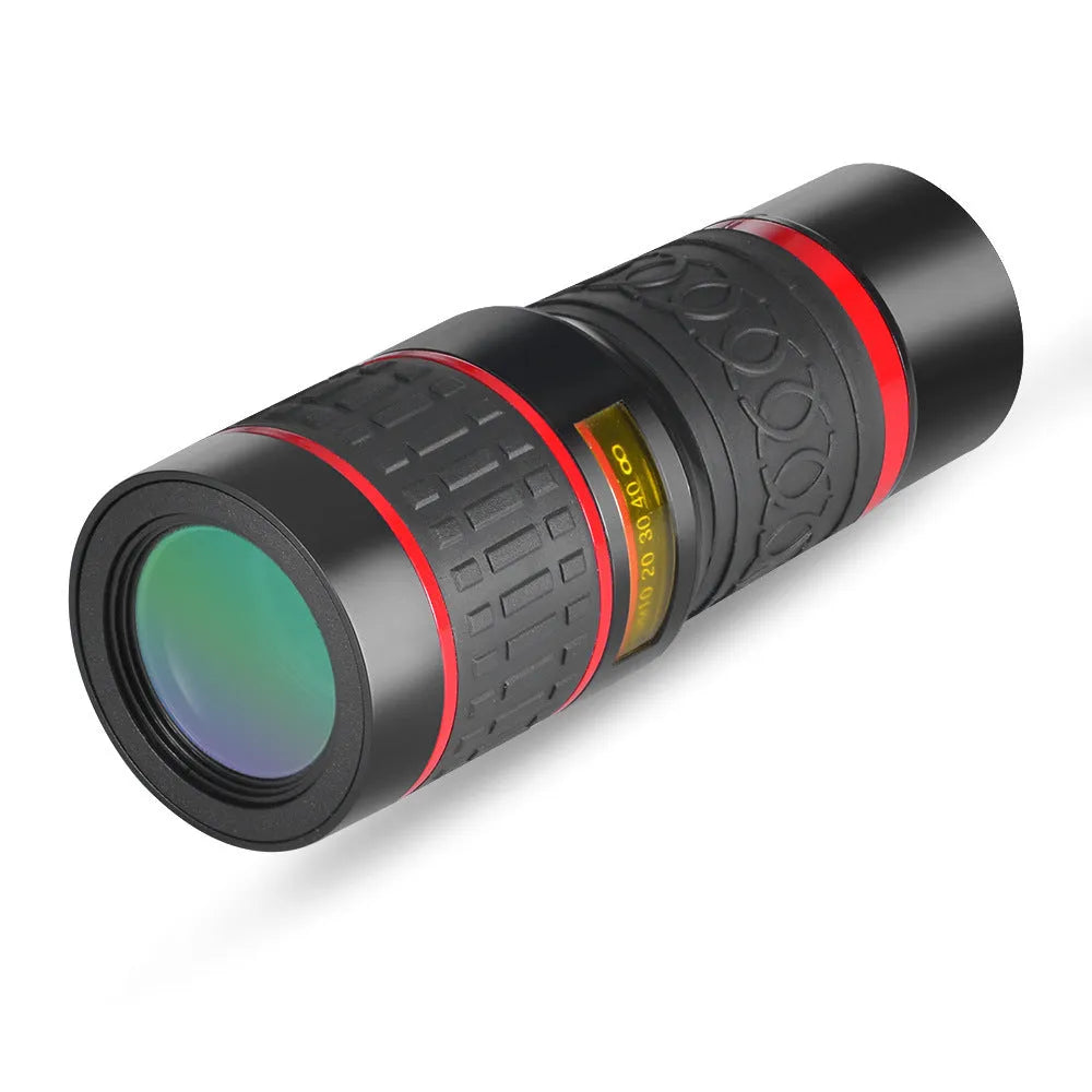 20x magnification smartphone telescope lens with universal mounting clip and eyecup mask on a table.