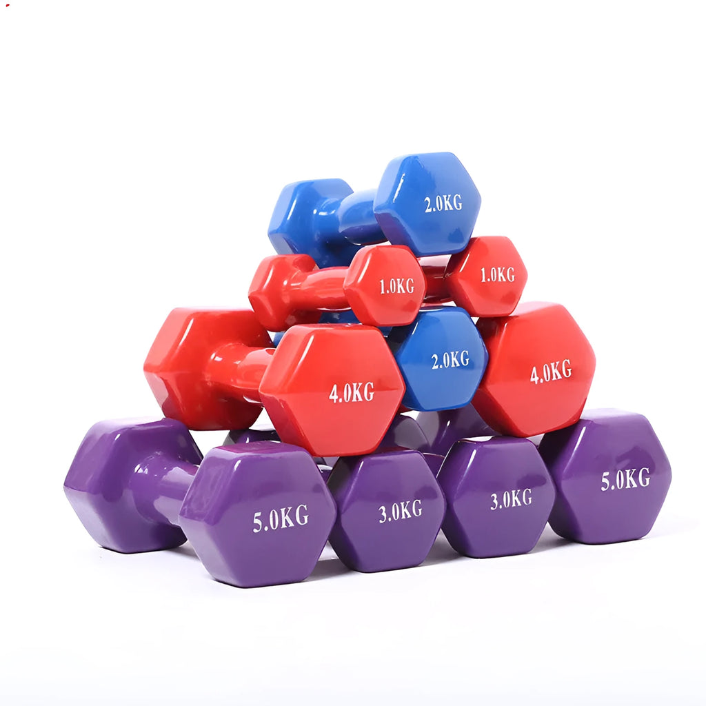 Bright coloured plastic-coated fitness dumbbell showing glossy finish on a home gym floor.