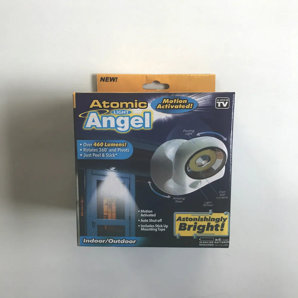 White Atomic Angel induction light unit showing compact design